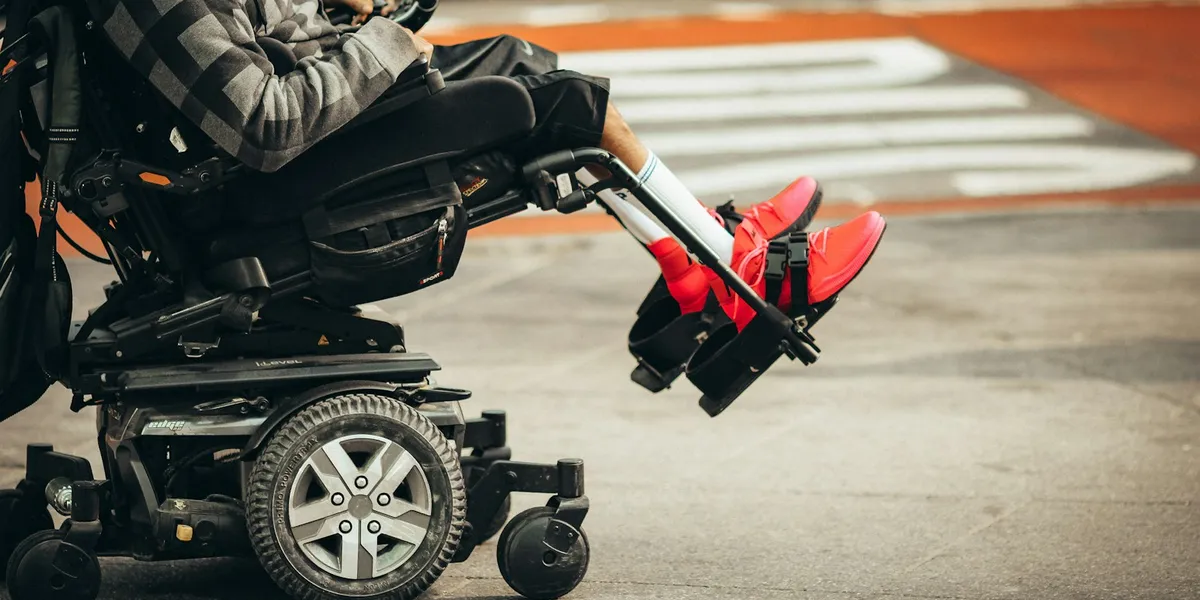 Person using a wheelchair outdoors